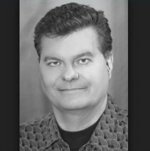 Black-and-white portrait photo of Mark Belling
